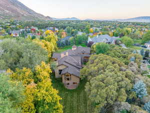 Aerial view at dusk featuring a mountain view