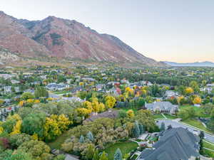 Aerial view at dusk featuring a mountain view