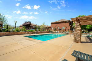 View of swimming pool featuring a patio