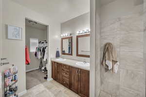 Bathroom with vanity and a textured ceiling