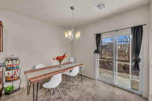 Dining space with an inviting chandelier