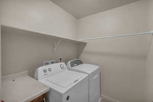 Laundry area with separate washer and dryer