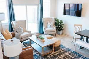 Living room with hardwood / wood-style floors