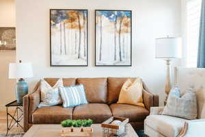 Living room featuring hardwood / wood-style flooring and plenty of natural light