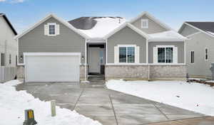 Craftsman inspired home with a garage