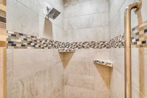 Interior details featuring tiled shower