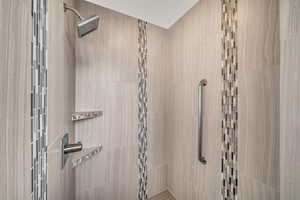 Bathroom with tiled shower