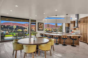 Dining space featuring a mountain view and sink