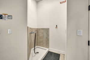 Bathroom with a tile shower