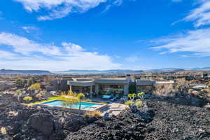 Exterior space featuring a mountain view and a patio