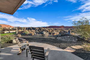 View of patio / terrace with a mountain view