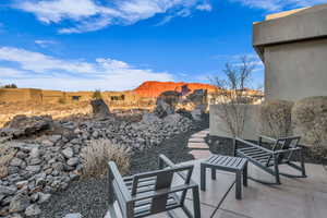 View of patio featuring a mountain view