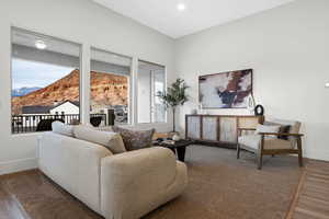 Living room featuring a mountain view and hardwood / wood-style floors