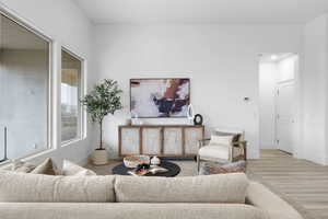 Living room with light wood-type flooring