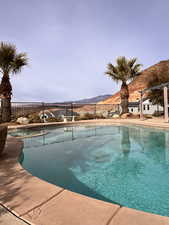 View of pool featuring a mountain view