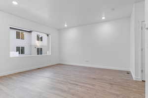 Empty room featuring light hardwood / wood-style floors