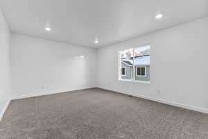 View of carpeted spare room