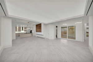 Unfurnished living room with light hardwood / wood-style flooring