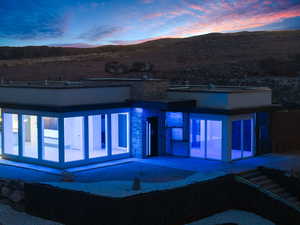 Exterior space featuring a mountain view and a patio