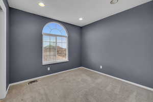 View of carpeted spare room