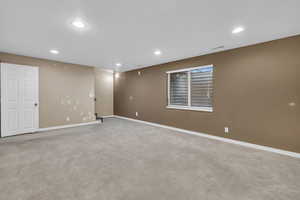 View of carpeted spare room