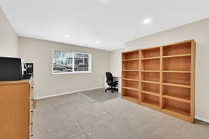 Unfurnished office with light colored carpet