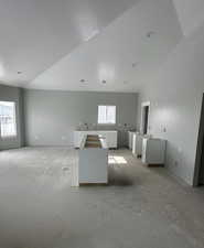 Spare room with washer / clothes dryer and a textured ceiling