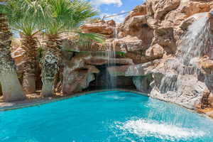 View of pool with pool water feature