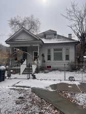 Bungalow featuring covered porch