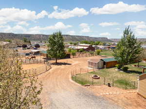 Birds eye view of property featuring a mountain view