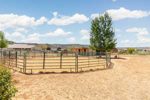 View of stable with a rural view