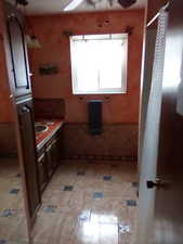 Bathroom featuring ceiling fan