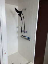 Bathroom with tiled shower