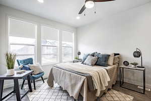 Bedroom featuring ceiling fan and light wood-type flooring