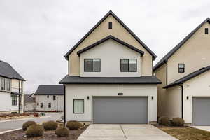 View of front of property with a garage