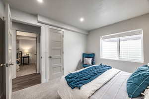 Bedroom with wood-type flooring