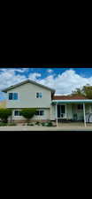 View of front of home featuring covered porch