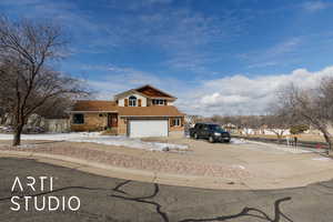 Tri-level home featuring a garage