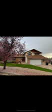 View of front of home with a garage