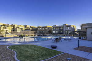 View of swimming pool featuring a patio and a pergola