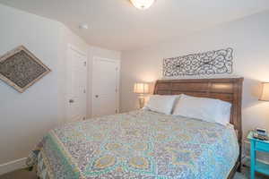 Bedroom featuring carpet flooring