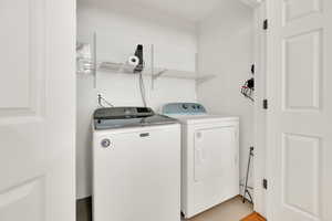 Clothes washing area with separate washer and dryer