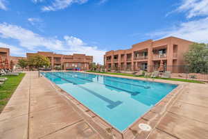 View of swimming pool featuring a patio area