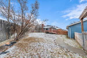 View of yard covered in snow