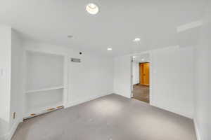 View of carpeted spare room