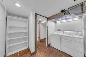 Laundry room featuring separate washer and dryer