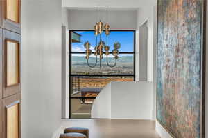 Dining space featuring a chandelier, a mountain view, and tile patterned flooring