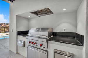View of patio / terrace featuring an outdoor kitchen