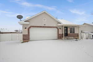 View of front of house with a garage