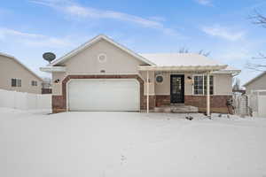 View of front of house with a garage